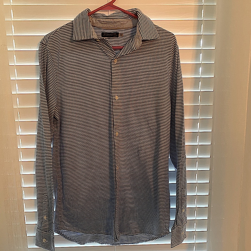 Button up collared blue and white striped shirt
